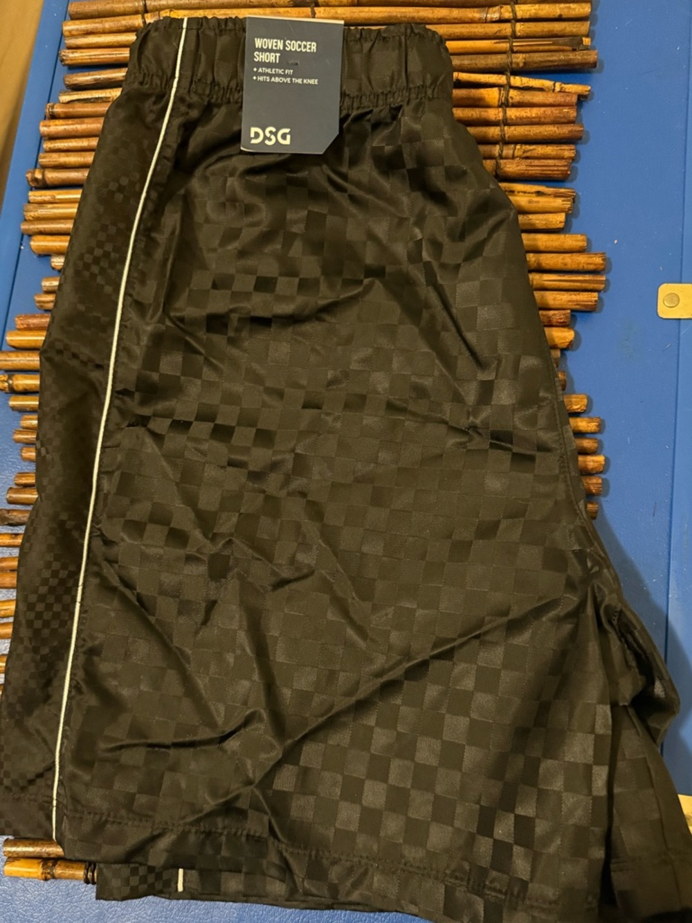 DSG Black Woven Youth Soccer Shorts with Contrast Piping